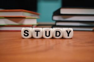 word "study" spelled out using dice - Home Tuition Hotspot Singapore